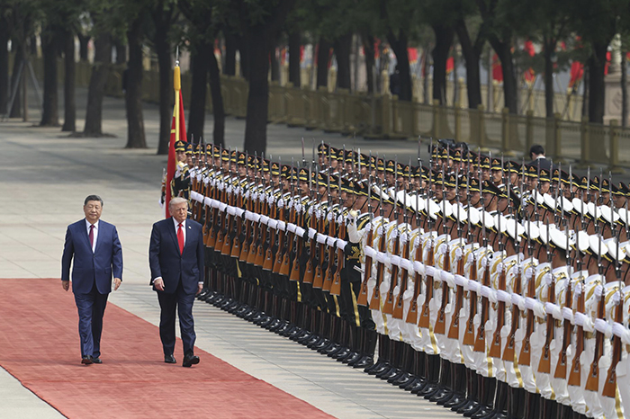 Trump y Xi Jinping buscan colaboración en Pekín, según analistas internacionales