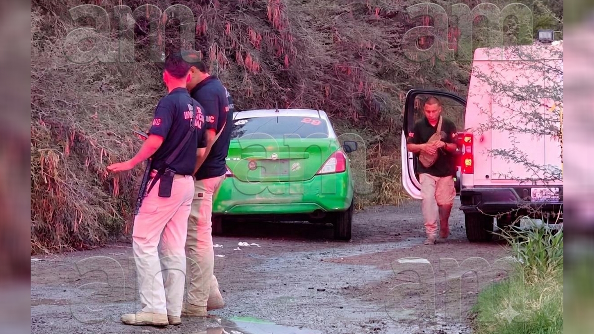 Cuerpo en cajuela de taxi abandonado en León, bulevar López Mateos